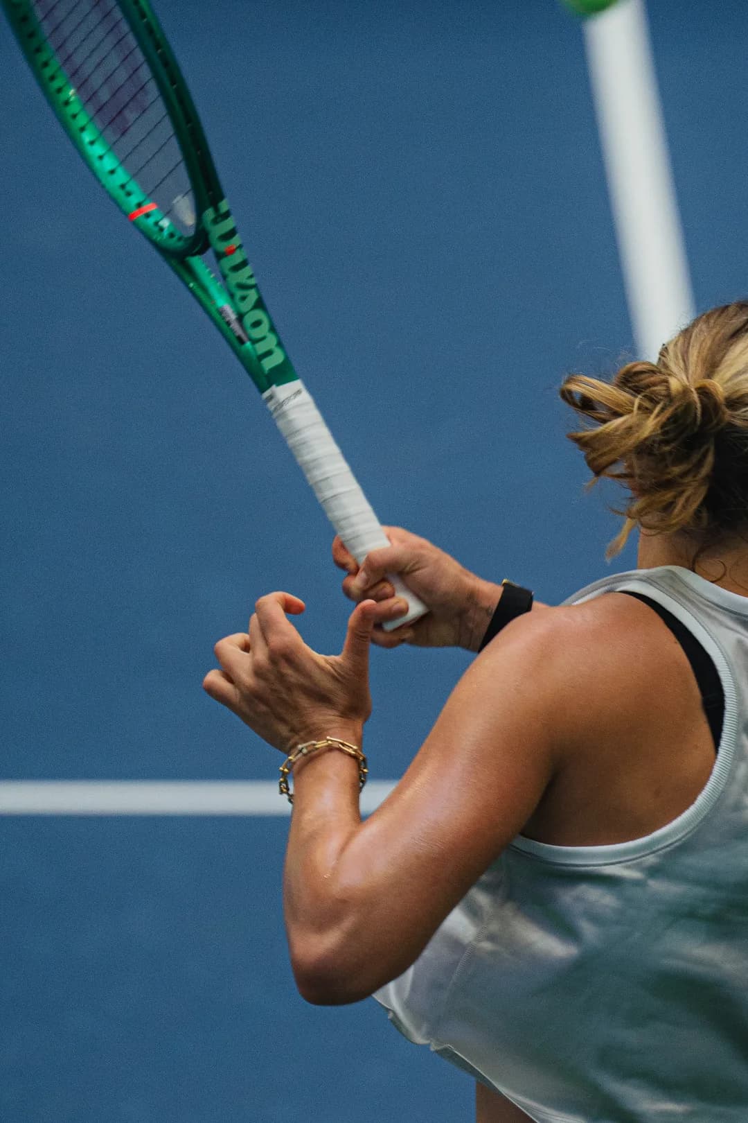Following through on a serve at the US Open
