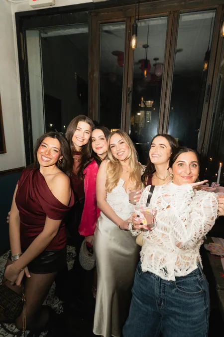Friends together at a birthday dinner