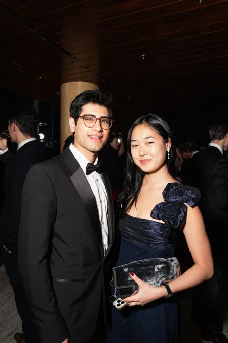 Couple posing at a black-tie gala