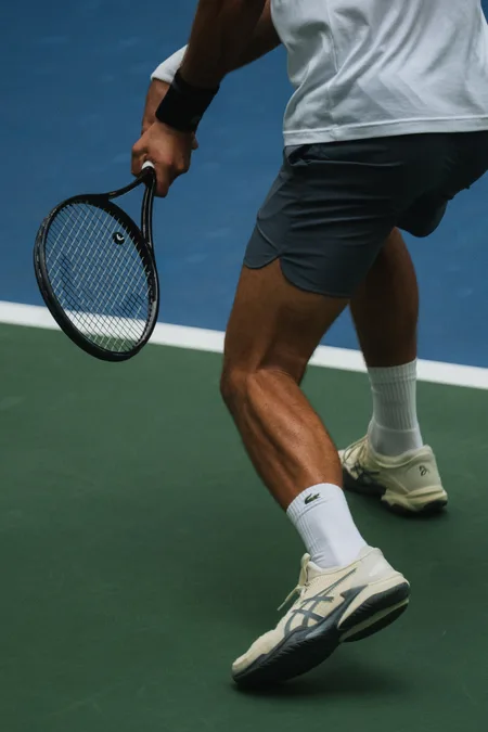Racket dropped below the ball on the follow-through